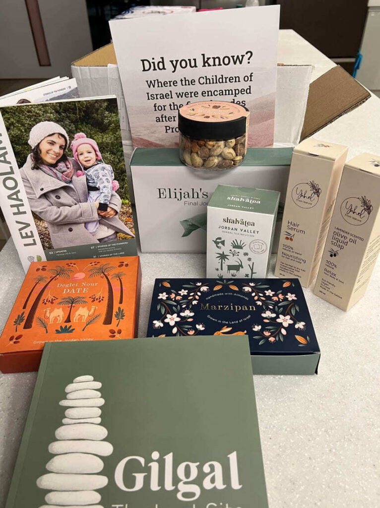 Family enjoying a Lev Haolam box of Holy Land gifts