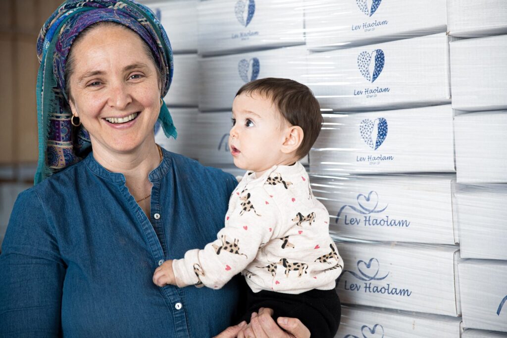 Founders of Lev Haolam with Holy Land crafts