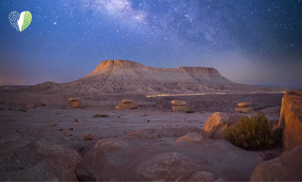 Traditional Bedouin tents set up in the sandy expanse of the desert