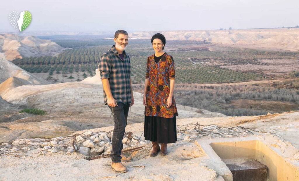 Biblical figure statue in rocky terrain