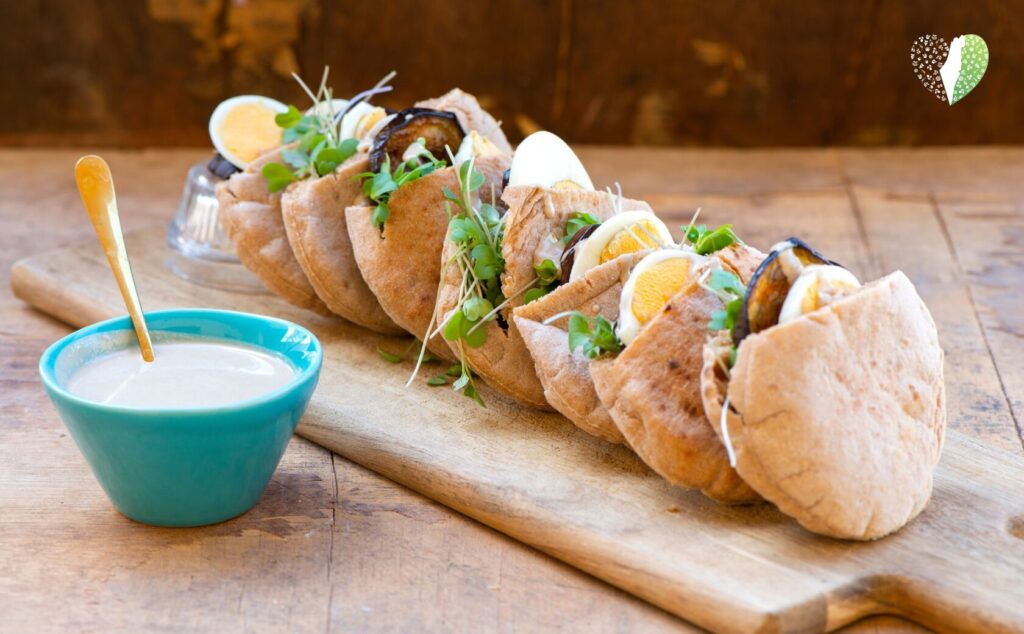 Sabich sandwich with egg and vegetables