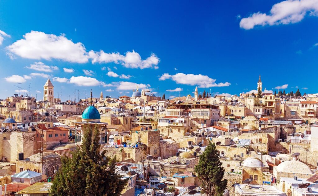 A serene view of the Mount of Olives at sunset