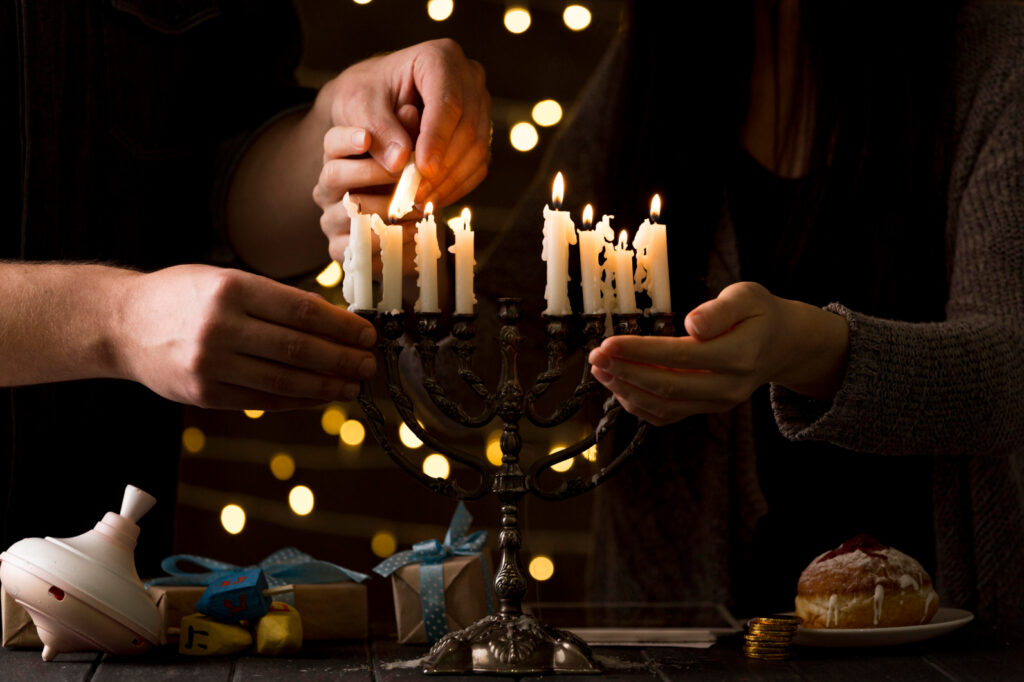 City streets illuminated by Hanukkah menorahs