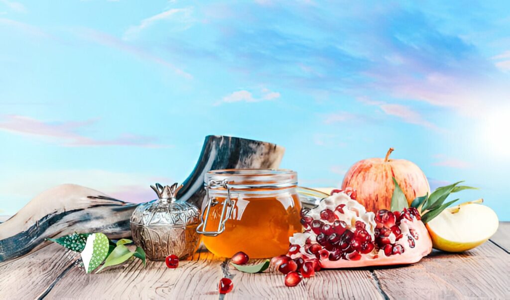 Traditional Rosh Hashanah meal with symbolic foods